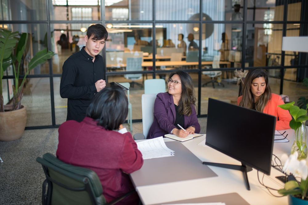 Recruitment operations team in a workplace meeting